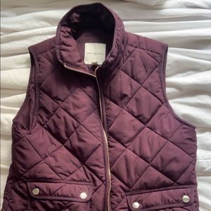 purple puffy vest